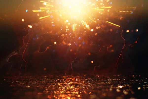 soyut glitter ışıkları arka plan. altın ve siyah. de odaklı