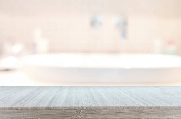 empty table board and defocused indoor bathroom background. product display concept