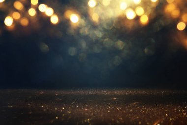 soyut glitter ışıkları arka plan. altın ve siyah. de odaklı