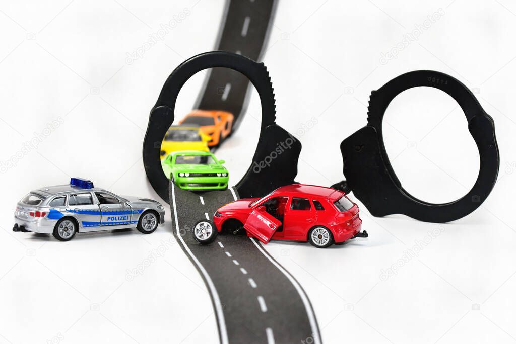  police toy car with handcuffs and car accident