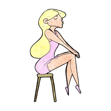 Taburede oturan çizgi filmci kadın.