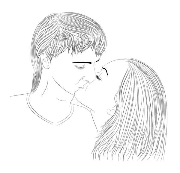 Поцелуй красивого парня с девушкой — стоковое фото
