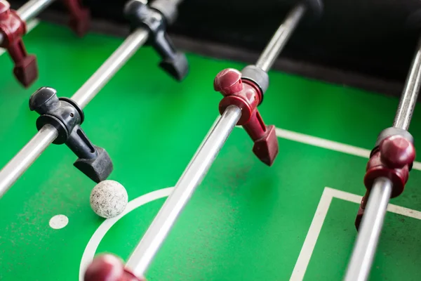Close up of a foosball game with soccer ball — Stock Photo, Image
