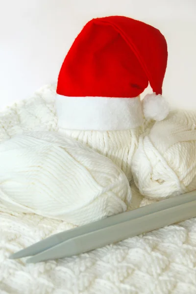 White yarn with a cap of Santa Claus — Stock Photo, Image