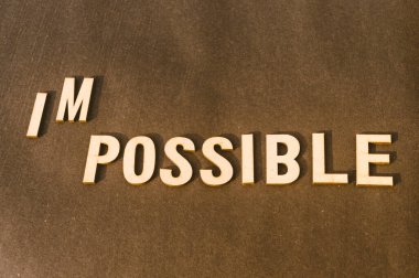 Nothing is impossible, the word itself says I am possible. Success and challenge concept. Retro style image.
