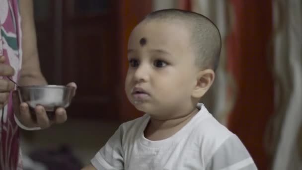 Happy Cute Baby Eating Food Head Shoulder Shot Close — Stock video