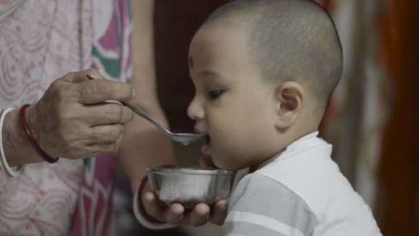 Happy Cute Baby Eating Food Head Shoulder Shot Close — Video