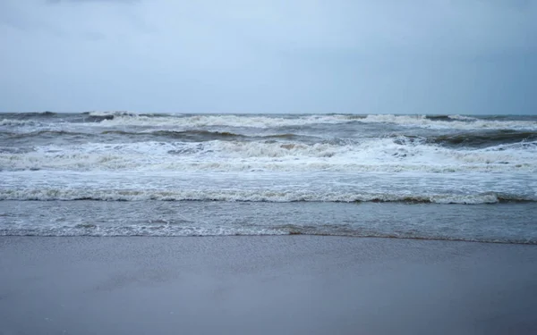 Sea Waves Crushing On Ocean Floor. Nature Background. Focus on Foreground. Puri, Odisha, India