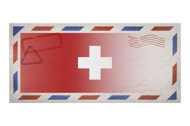 Postal envelope. Envelope with the image flag of Switzerland. Swiss flag. Old crumpled envelope with stamps. Copy space. Blank mock up. Creative template.