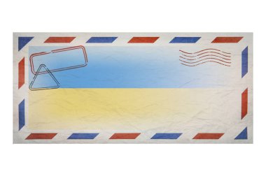 Postal envelope. Envelope with the image flag of Ukraine. Ukrainian flag. Old crumpled envelope with stamps. Copy space. Blank mock up. Creative template.