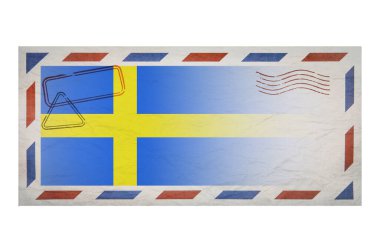 Postal envelope. Envelope with the image flag of Sweden. Swedish flag. Old crumpled envelope with stamps. Copy space. Blank mock up. Creative template.