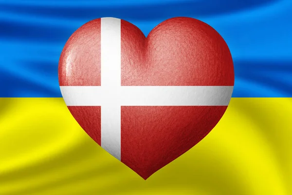 Flags of Ukraine and Denmark. Heart color of the flag on the background of the flag of Ukraine. The concept of protection and solidarity. Military and humanitarian assistance.