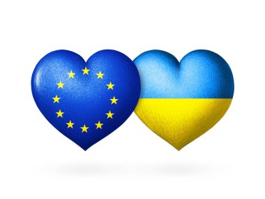 İki bayrak. Ukrayna ve Avrupa Birliği bayrakları. Bayrakların renginde iki kalp beyaz bir arkaplanda izole edilmiş. Koruma, dayanışma ve yardım kavramı