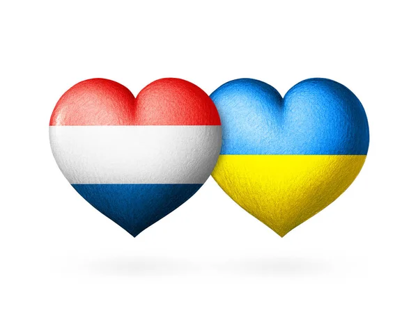 우크라이나와 네덜란드의 국기이다 색깔에 사람의 배경에 있었다 도움의 — 스톡 사진