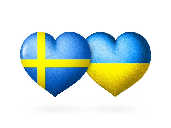 两面旗帜乌克兰和瑞典的国旗 两颗心在国旗的颜色上隔离在一个白色的背景上 团结和帮助概念 — 图库照片