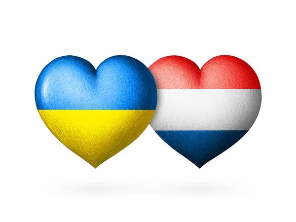 우크라이나와 네덜란드의 국기이다 색깔에 사람의 배경에 있었다 도움의 — 스톡 사진