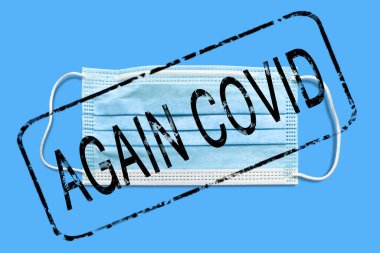 Medical mask. Lettering Again Covid and surgical mask. Protection from respiratory infections. Isolate on blue background. Danger of a viral infection. Health care and medical concept