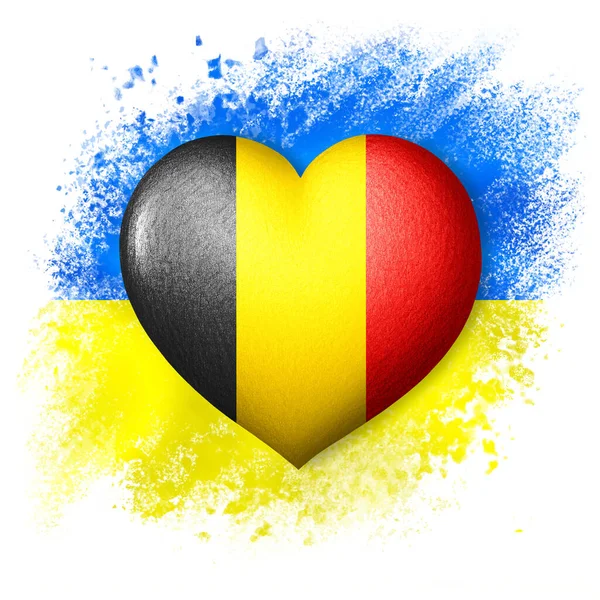 Flags of Ukraine and Belgium. Heart color of the flag on the background of the painted flag of Ukraine. The concept of protection and solidarity. Military and humanitarian assistance.