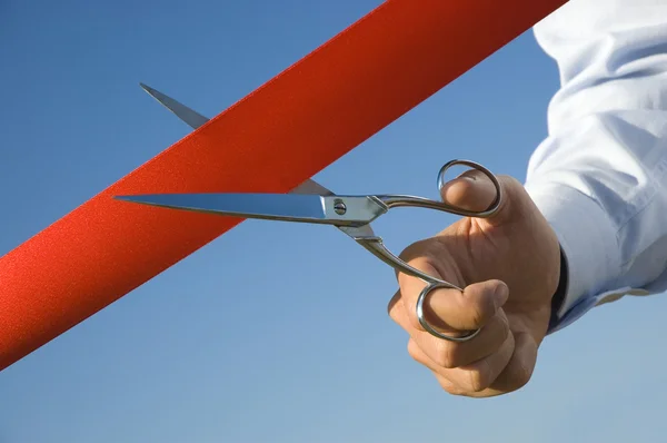 Cut of the red ribbon — Stock Photo, Image