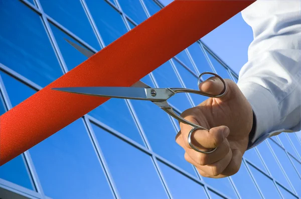 Cut of the red ribbon — Stock Photo, Image