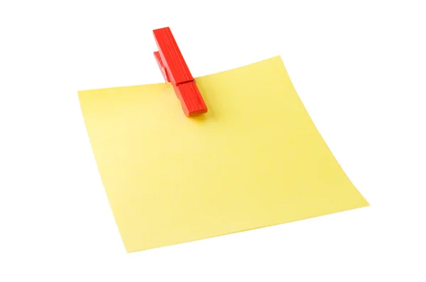Post it with red peg Royalty Free Stock Images