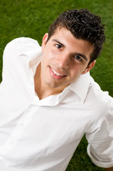 Young man on grass — Stock Photo, Image