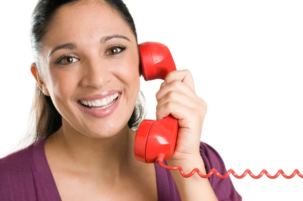 Sorrindo jovem operador com telefone vermelho — Fotografia de Stock