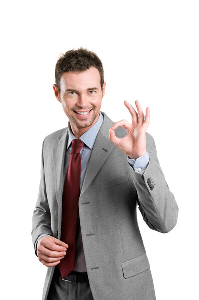 Satisfied business man showing okay sign