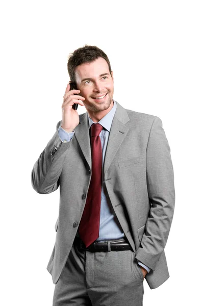 Homem de negócios feliz falando no celular — Fotografia de Stock