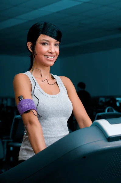 Exercising with treadmill at gym — Stock Photo, Image