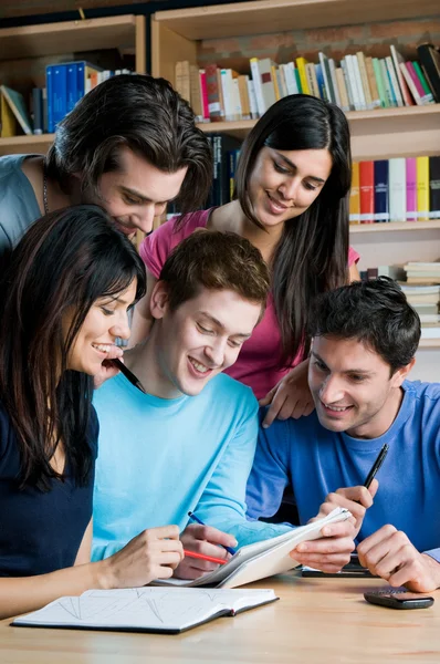 Students in college library — Stock Photo, Image