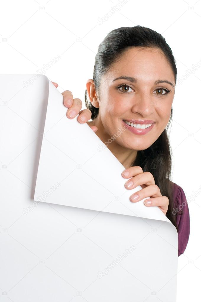 Young woman holding folded corner of a blank signboard