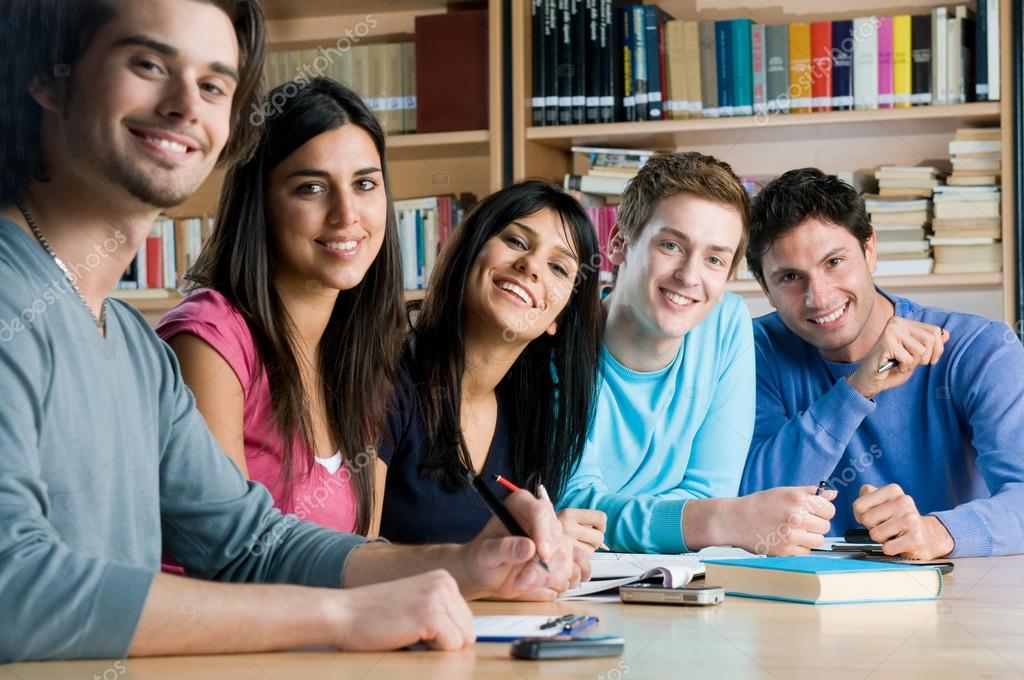 Smiling group of students in a library ⬇ Stock Photo, Image by © ridofranz  #12658160