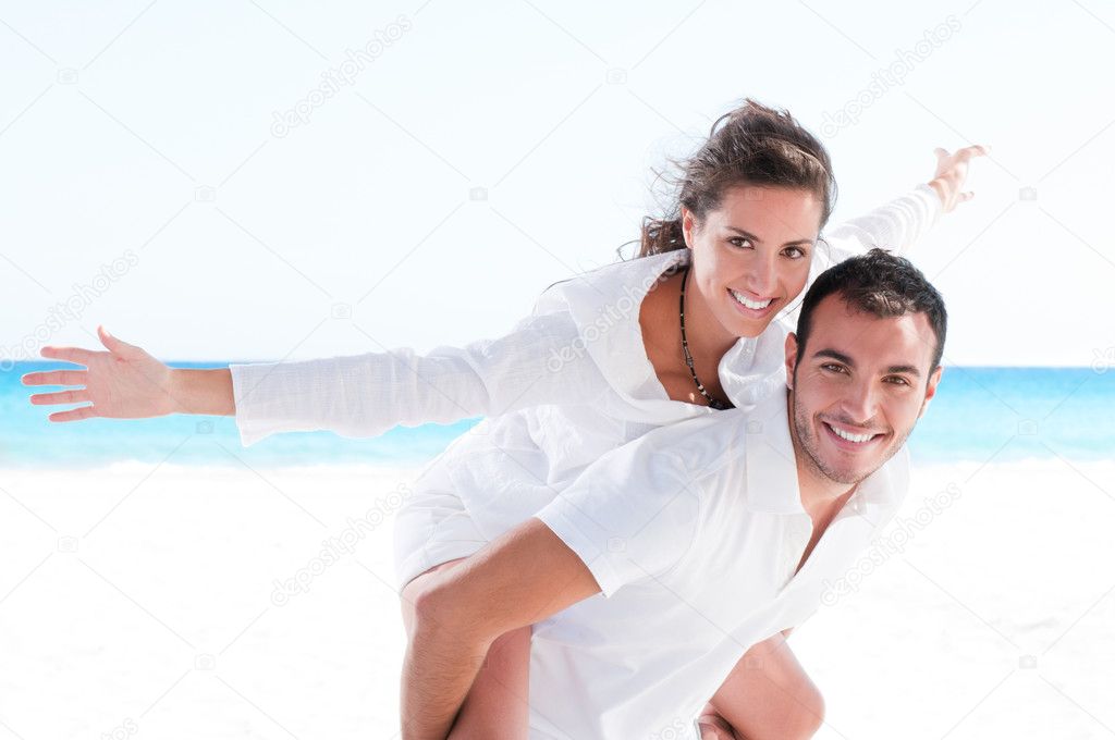 Young couple together at beach