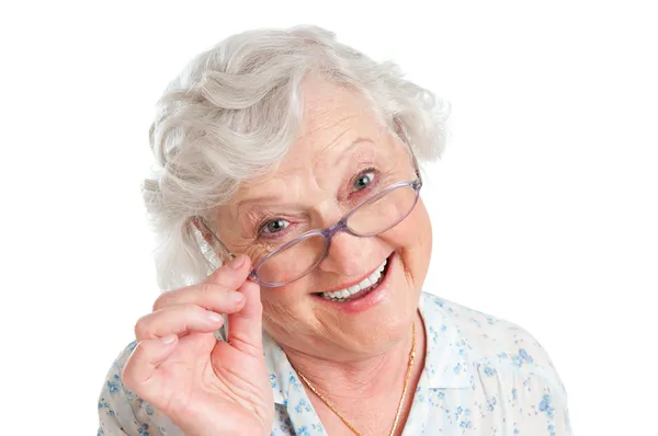 Zufriedene Seniorin mit Brille — Stockfoto