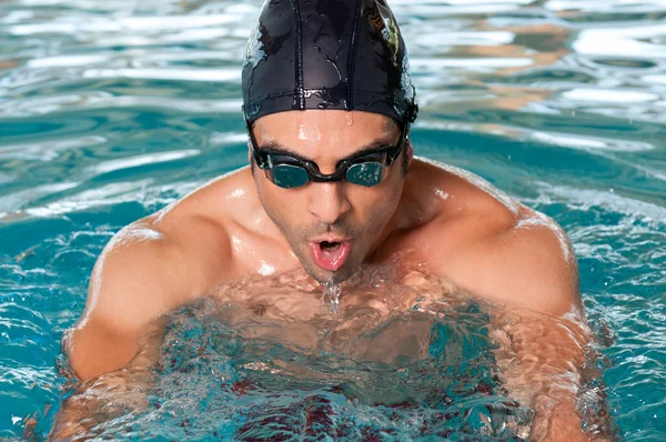 Swimming young man — Stock Photo, Image