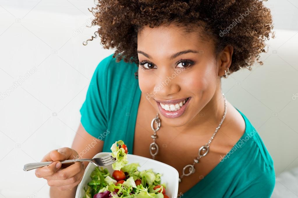 African American Woman Eating Salad