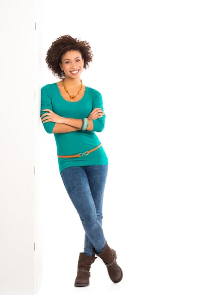 Woman Leaning Against a Panel — Stock Photo, Image