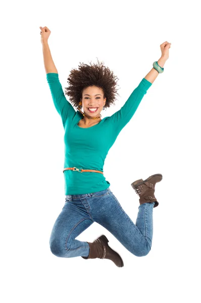 Kvinna hoppa i glädje — Stockfoto