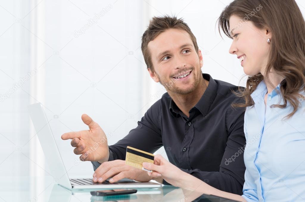 Young Couple Shopping Online