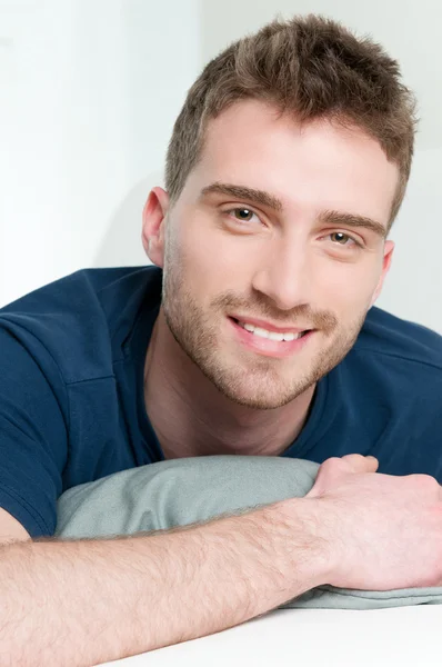 Happy smiling young man Stock Photo