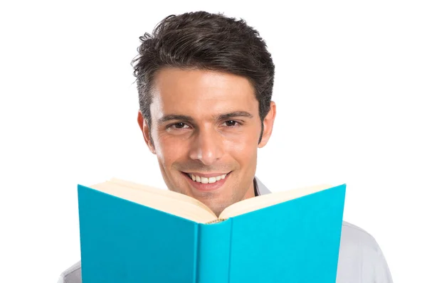 Bir kitap ile mutlu bir genç adam — Stok fotoğraf