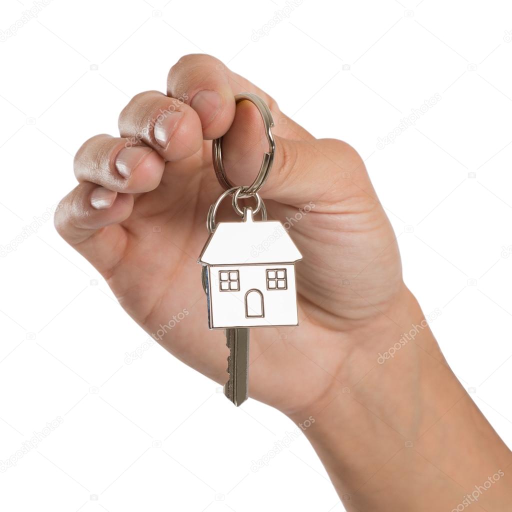 Hand Holding House Key — Stock Photo © ridofranz 32808909
