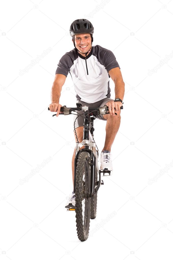 Young Male Cyclist On Bicycle