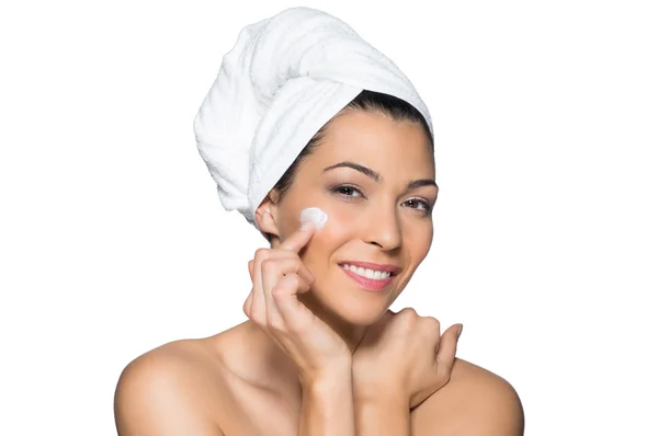 Beautiful Woman Applies Lotion to Her Face — Stock Photo, Image