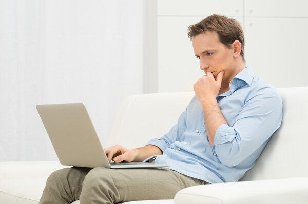 Worried Man With Laptop