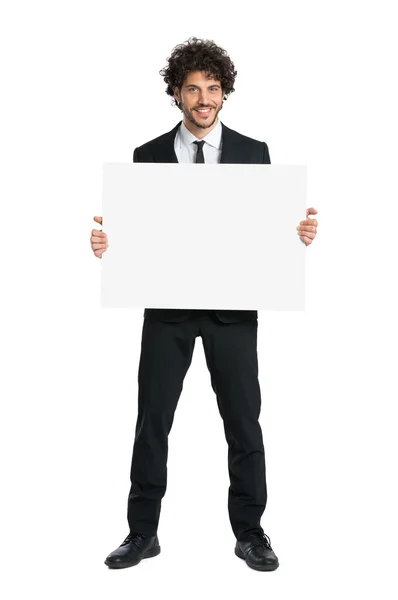 Uomo sorridente in smoking Holding Placard — Foto Stock