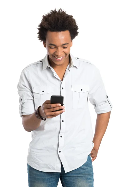 Африканський зображений юнаком iз стільниковий телефон — стокове фото