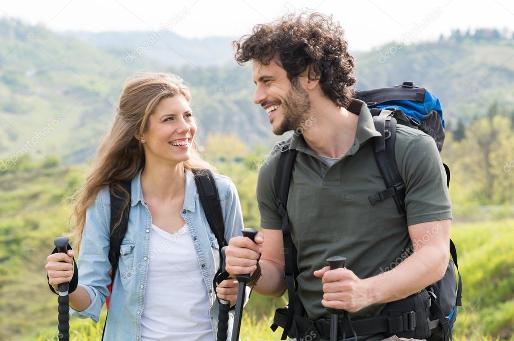 Couple Hiking In Countryside Stock Photo by ©ridofranz 46252159