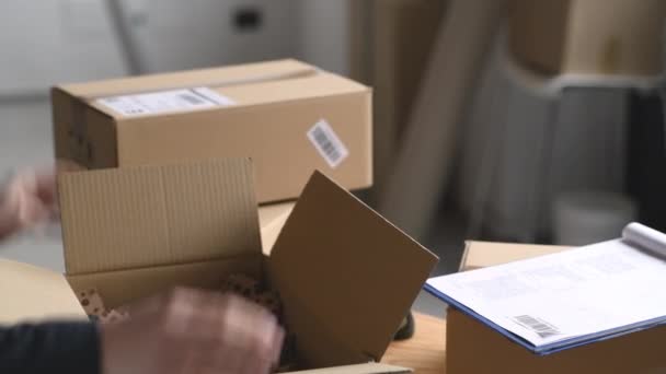 Hands Young Woman Preparing Parcel Delivery Worker Close Cardboard Package — Stock Video